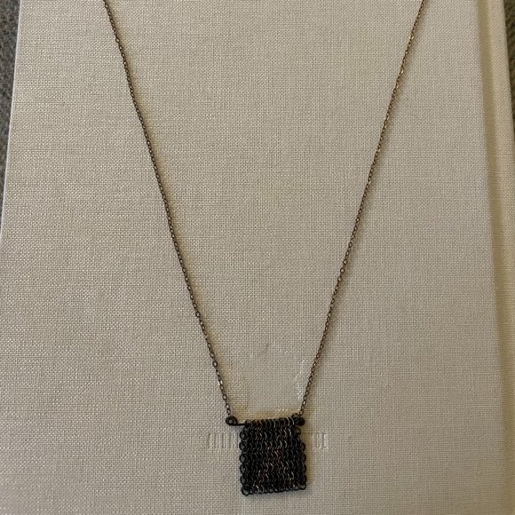 Silver Necklace with "X" in hanging chain - Picture 2 of 2